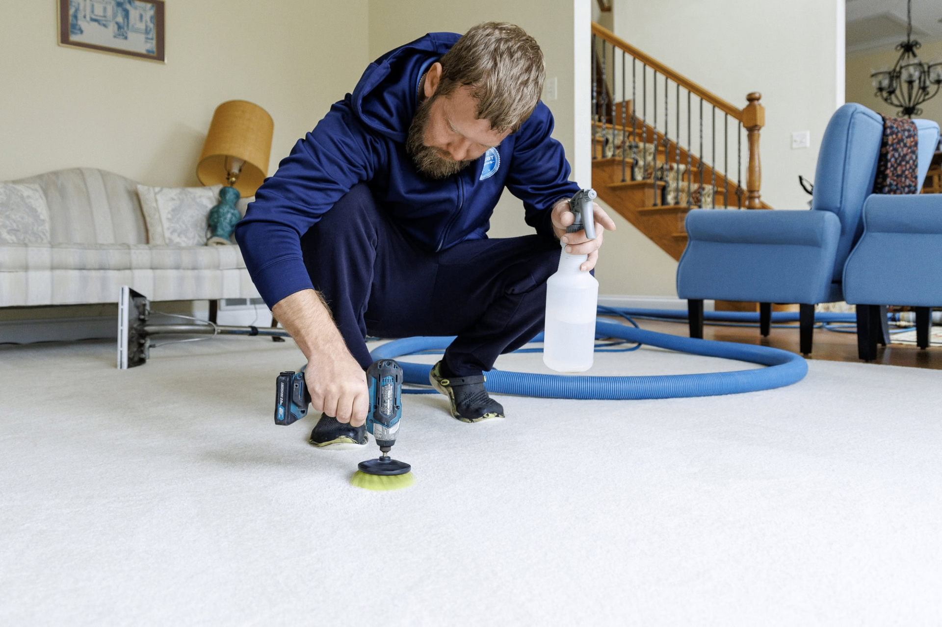 Ernest Steamers technician cleaning carpet